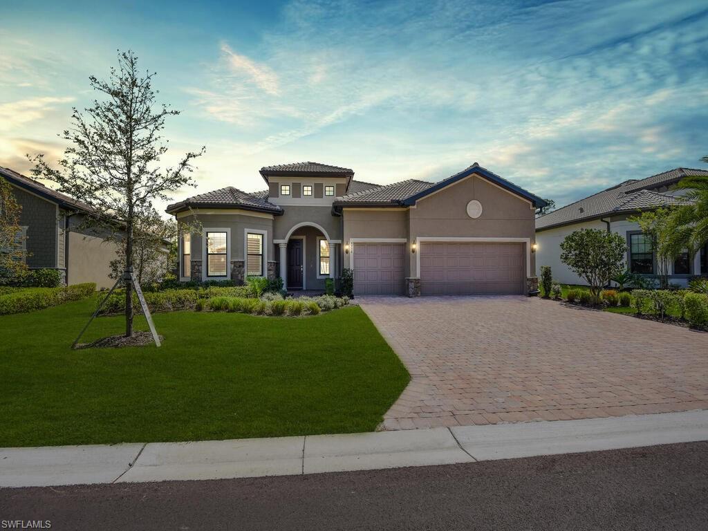 Quick occupancy, like new Estate home in the gated, resort-style community of Greyhawk at Golf Club of the Everglades. "Pinnacle" on a 65’ wide lot with S.E. EXPOSURE, extended pool deck, light coastal contemporary finishes and a bright great room floor plan. Sunny, open-concept living space has Zero-corner impact sliding glass doors open to the large covered lanai and 25' pool. Primary suite offers quartz countertops, soaking tub, large shower & large closet. Soaring 12’ coffered/tray ceilings, Plantation shutters and simulated wood plank tile flooring. The white and bright gourmet kitchen with natural gas 5-burner cooktop, stainless steel appliances, an over-sized quartz island/countertops, pantry, wine cooler, and bar. 18 hole Rees Jones designed championship golf course! Amenity Center includes a resort-style pool with lap lanes & spa, restaurant with indoor bar & Bahama bar, fire pit, Bocce & Pickleball courts and state-of-the-art fitness center with Yoga/Pilates studio, a dynamic social hall & calendar, a full-time activities director & a sports director. Social membership includes limited golf from May-October for a low cart fee. No CDD! Ask about special financing options!