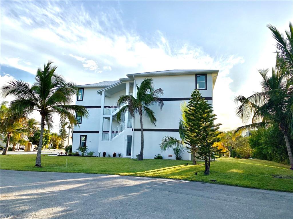 New modern and beautiful duplex with 3 bedrooms in suite fully equipped in each unit. The property has a beautiful bay views and it is surrounded by lush tropical trees and foliage on the back bay. It features great spaces tastefully decorated by interior designers. The property is just 2 blocks from the beach!! It is walking distances to restaurants. Family-friendly activities, movie theaters, and supermarkets. This premium unit is perfect for full time investor ( Vacation rental the upstairs unit does 12k a month, the other unit 10k  or monthly lease )  family side and investor side combo or two families full time