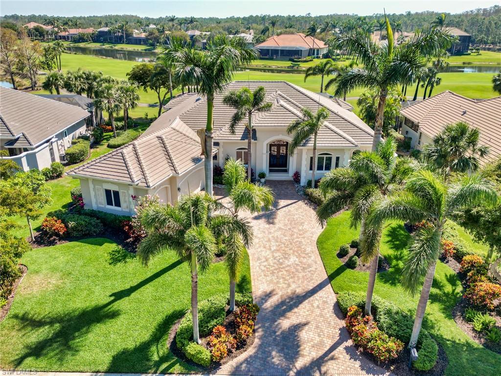 FULL GOLF MEMBERSHIP TO SHADOW WOOD COUNTRY CLUB NOW AVAILABLE-SKIP ALL WAITLISTS! Premier Custom Estate home built by Frey & Sons in the neighborhood of Oakbrook in Shadow Wood at the Brooks. Split floor plan w/3 bedrooms+ den, 4 (3/1) en-suite baths & 3 car air-conditioned garage. Enter through Cantera doors into the large great room w/custom accent wall w/ 85" TV & electric linear fireplace, 6 sectional coffered ceiling & limestone flooring. Disappearing sliders open to the spectacular lanai w/views of SW 7 N golf course, lake & preserve. Rock accents & landscaping enhance the gas heated pool/spa w/2 water displays, sun pad, fireplace & outdoor kitchen. Kitchen features white custom cabinetry & quartz countertops. Dry bar w/wine cooler. Den has white cabinetry w/2 built-in desks. Double doors open into the primary suite w/sitting room, custom closets & en-suite bath w/dual sinks, soaking tub, walk in shower, & private outdoor shower.  Updates include roof/gutters 2019, Storm Smart electric screens for lanai & front door, Kohler generator, epoxy coated garage floors w/custom built-in cabinets & sink, exterior/interior painted, smart security system, pool pump 2019 and lots more.