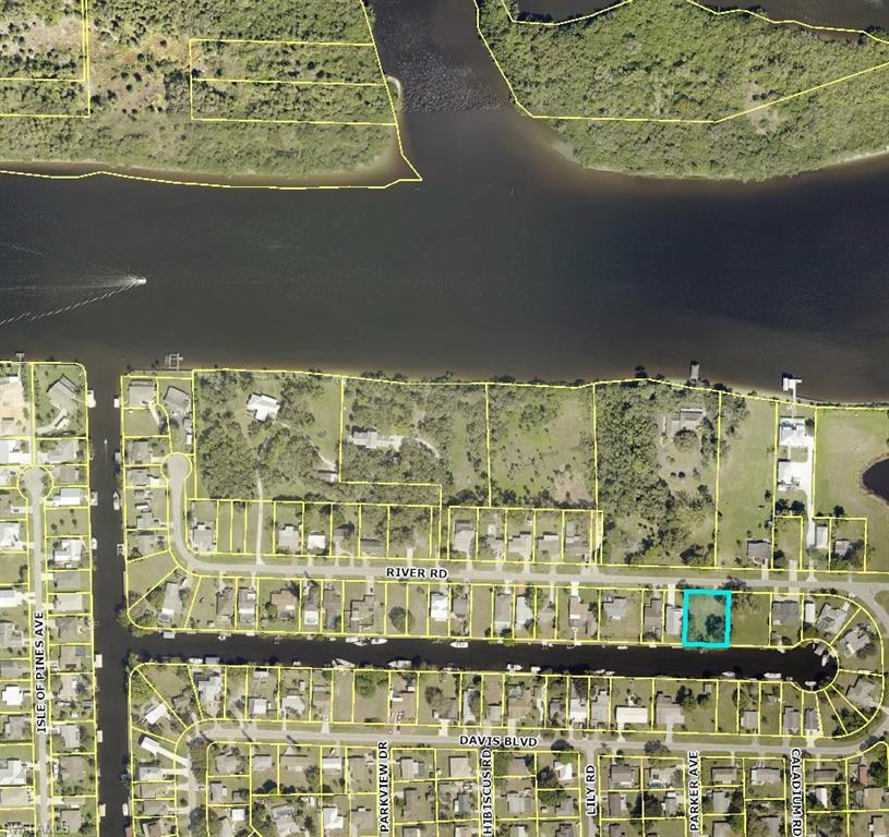 Deep-water wide canal (100 feet) with SAILBOAT Access and one turn to the river.  South facing!!!   Home has been cleared and site is ready for your new custom-built dream home.   City Water/Sewer and Electric already available.  Double lot is .41 acre and is on a cul-du-sac street.   Property offers mature citrus trees.  Caloosahatchee River Views from front yard!   Fort Myers Shores is a gulf access community close to downtown Fort Myers and I-75.