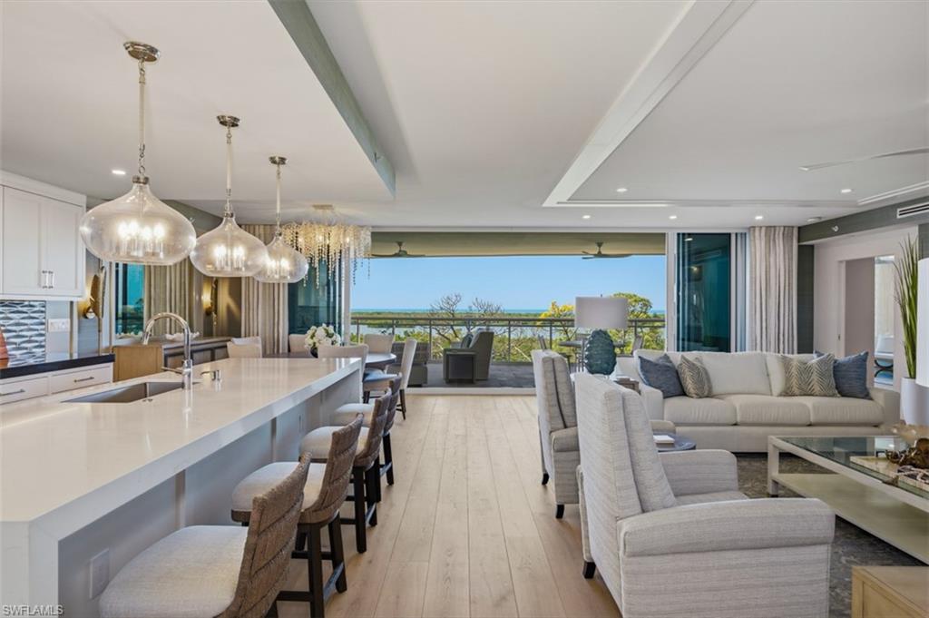 Coastal Elegance abounds in this 4 Bedroom 4 Bath residence in Tower 400 at Kalea Bay. Expertly designed and appointed, this unit is outfitted with numerous custom features and a serene, calming palette.  Beautiful open floor plan and a Chef's kitchen equipped with Wolf and Subzero appliances.  Floor to ceiling sliding glass doors present the large open air lanai and fantastic views of the Gulf sunsets.  A wall of windows in the Owner's Suite optimize the gorgeous Gulf view and landscape. Spa like Owner's Suite bath has large walk in shower, dual sinks, and soaking tub.  Enjoy Tower 400 Rooftop pool, open air fitness, and community lounge room.  The Club at Kalea Bay on property boasts restaurants, salon, guest cottages, resort pools, pickleball, tennis and a State of the Art Wellness Center.  Kalea Bay is resort style living at its finest.