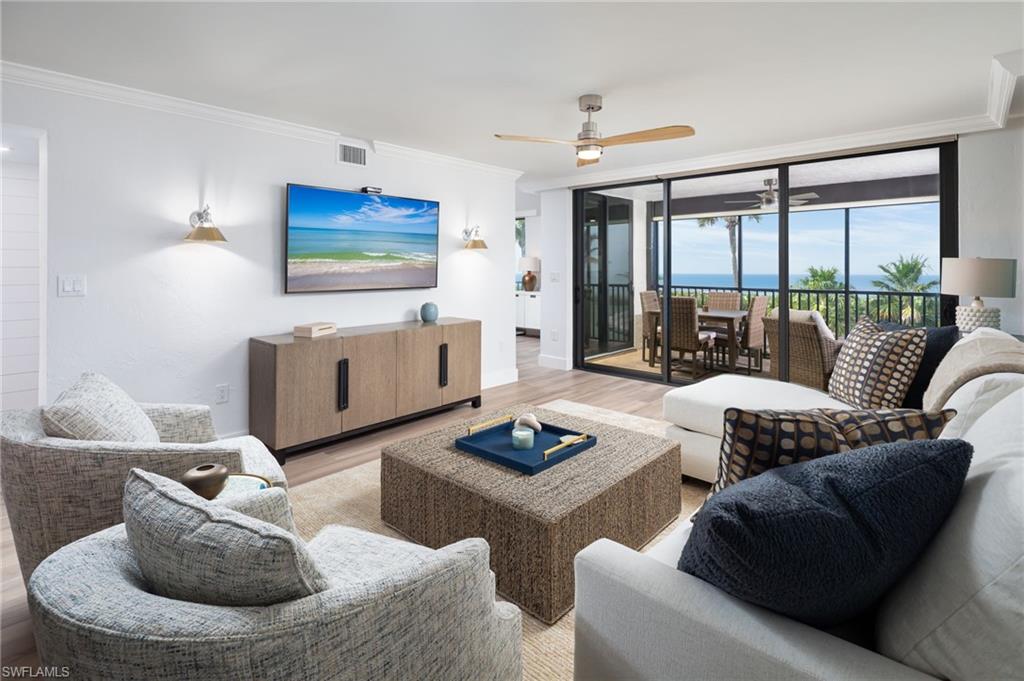 RARELY AVAILABLE– TOTALLY REMODELED BEACH FRONT CONDO – 3 BEDROOM – POOLSIDE CABANA – GARAGE - BOAT DOCK W/ LIFT - TURNKEY - END UNIT. Minimum of Two weeks is required. Designer-renovated and impeccably maintained, this stunning 3-bedroom beachfront condo is a rare lease opportunity on Vanderbilt Beach. An end unit with multiple balconies and direct beach views, it has been completely redesigned with custom finishes and with a focus on comfort and relaxation. This gorgeous condo has incredible features - Sun Shade Window Coverings, Plantation Shutters, Whirlpool W&D, Beautiful Porcelain Wood Flooring throughout, Hand Crafted Wainscoting, Custom Cabinetry, Electric Hurricane Shutters, Ship Lap Walls for a coastal character, and Direct Beach Views. Screened Lanai and Balcony off the Dining Area. The master bedroom has a king bed, Guest room has a queen bed and the 3rd bedroom has two twin beds plus a trundle. The kitchen in this gorgeous beachfront condo is a standout feature, meticulously designed for both functionality and style. Here’s a detailed breakdown of its impressive attributes: Stainless Steel Kitchen Aid Appliances, Beverage Fridge, Quartz Counters, Shiplap, New lighting and plenty of Storage. The EXTRA Beachfront Cabana has a Bathroom and Shower for your convenient pool/beach use and is steps away to poolside and the beach. The Bayshores of Vanderbilt Beach has a plethora of amenities and offers an Elevator, Private Beach Access, Large Heated Pool, Tennis Court, Shuffleboard, Pickleball and a storage area. This is truly an exceptional, move-in ready beachfront residence with every detail curated for luxury coastal living and for your relaxation.