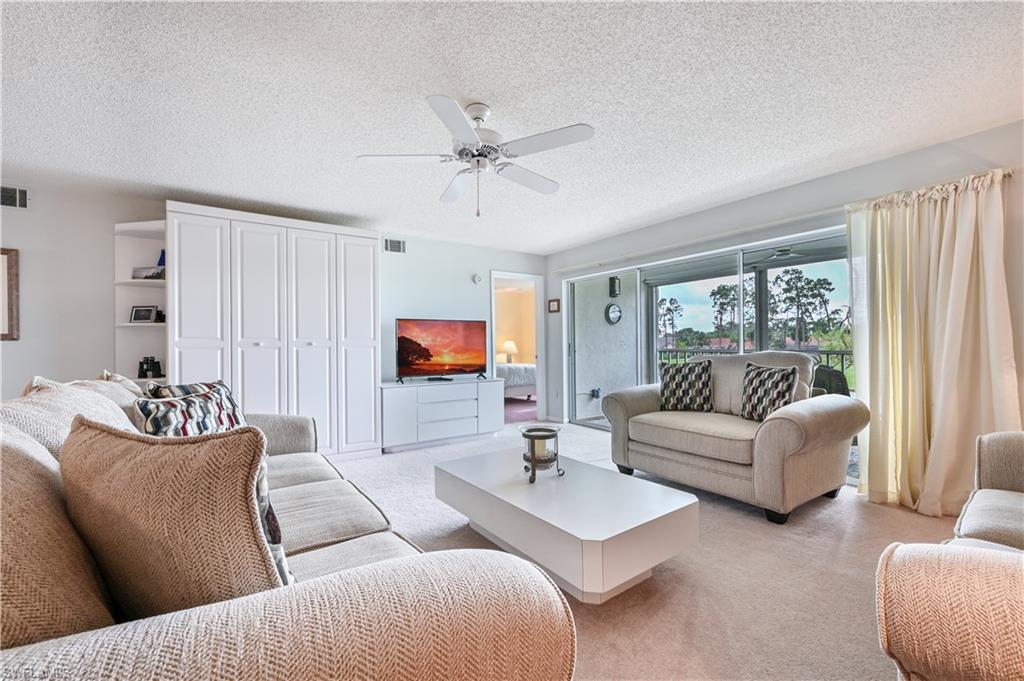 Welcome home! This incredible condo is being sold turnkey and offers many upgrades including: hurricane shutters, stainless steel kitchen appliances, backsplash, countertops, cabinets, custom lighting and much more. Make yourself at home in this beautiful 2 bedroom and 2 bathroom condo that boasts an incredible view of the golf course and also overlooks the lake! Centrally located just a short drive from downtown Naples to experience world class shopping, dining and beaches. 

If you are ready to enjoy the Florida lifestyle in the comfort of an amazing condo that is also situated in one of the most desirable communities in Naples, then look no further. 

Royal Wood Golf and Country Club is a bundled golf community for those seeking superior golf, quality tennis, friendly neighbors and first rate dining in an active community.