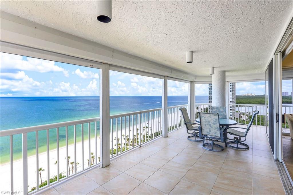 C13664 PENTHOUSE BEACHFRONT NAPLES CAY CONDO ~ ON THE SAND!  Rarely available 02 PENTHOUSE, first time ever on MLS. YEAR ROUND SUNSETS WITH UNOBSTRUCTED GULF, BEACH AND CLAM BAY VIEWS.  The living room cathedral ceiling is 18 feet tall, with two skylights and a large round picture window facing the Gulf. TWO WRAP AROUND LANAI'S totaling over 1,100 square feet ~ one on the main level and one PRIVATE ROOFTOP BALCONY. OVERSIZED PRIVATE GARAGE just outside the main lobby/elevator. NEW ELEVATORS TO BE INSTALLED STARTING MAY 2024, ASSESSMENT PAID. 2,484 SF under air, 2 large bedrooms + large den with the flexibility to convert to a third bedroom. Private climate controlled storage unit. Beach House at Naples Cay lives like a house on the sand, with all the conveniences of a condo.  Only 33 units, three per floor. PET FRIENDLY building allows two pets. Naples Cay is nestled between Park Shore and Pelican Bay, a 24 hour guard gated beach community offering a unique level of privacy and tranquility, yet is within walking distance to fine dining, shopping and entertainment of Venetian Village, Waterside Shops, and Artis Naples. Centrally located in Naples. Short drive to Mercato and 5th Ave.