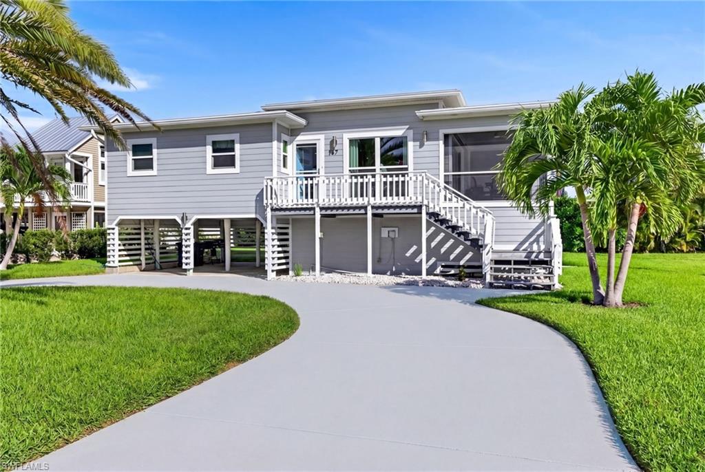 Welcome to paradise in the highly sought-after Gulf Island Manor Association (GIMA) on Fort Myers Beach. Perfectly positioned in a desirable mid-island location, this beautifully remodeled single-family home places you just moments from shopping, restaurants, entertainment, and the white sandy beaches that make Fort Myers Beach so special. As a resident of this PRIVATE NEIGHORHOOD, you will immediately become part of the community and enjoy sunrise at the bay and sunset on the gulf, with your neighbors. The exclusive amenities include a private beach access with cabana, a private bayfront park featuring a tiki hut, and community boat dock — offering the ultimate Southwest Florida lifestyle both on and off the water.  

Every inch of this home has been thoughtfully remodeled with exceptional attention to detail throughout and high end finishes. From the designer furniture to carefully curated finishes, no space has been overlooked. The home sits on a spacious oversized lot and features an open great room layout, kitchen with stainless steel appliances and quartz counter tops, an expansive screened in porch, two generously sized bedrooms, two luxurious full bathrooms, and a versatile bonus space.

Being offered Turnkey Furnished, the home is bright, inviting, and move-in ready and blends coastal elegance with modern comfort in one of Fort Myers Beach’s most desirable private communities. Whether you’re searching for a full-time residence, seasonal retreat, or investment opportunity, this property delivers the perfect combination of location, lifestyle, and luxury.