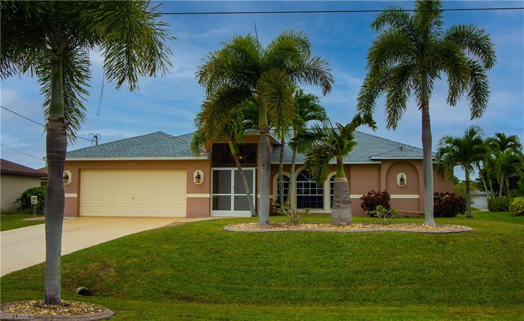 Beautiful SW Cape! Come and view this well maintained 3 bedroom/2 bath home conveniently located near CC Pkwy. & Chiquita Blvd! This well-maintained home has NEW roof, A/C - 5 yrs old, Hot water heater - 3 yrs old.  Open and spacious floor plan perfect for entertaining, high ceilings, breakfast bar, pantry, interior laundry, crown molding in primary bedroom, Walk-in Shower w/ two shower heads in primary bath, amazing fruit producing mango, orange and avocado trees in back yard and more! Unique enclosed lanai with engineered wood floors and an attached huge entertainment/play patio area (31' x 15') with screened cage. Plenty of room for Pool! Enjoy the convenience of shopping (Publix+), restaurants (Lobster Lady+), medical facilities, and more just a few blocks away! Watch the sunset at Cape Harbour just 3 minutes down Chiquita Blvd.! Come see this home today and follow your dream...home!