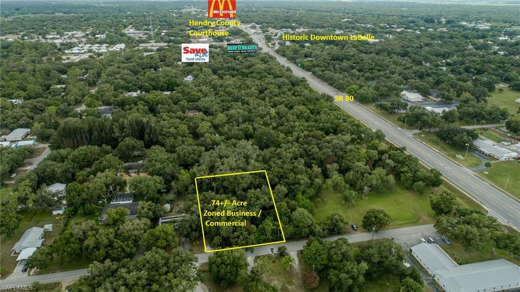 A .74+/- acre commercial / business zoned lot on S. Cypress Street, in the heart of beautiful LaBelle! As the town grows, properties like these are becoming hard to find, this is an excellent opportunity to build your business or invest in the future of LaBelle.  The property is zoned business and is located the perfect spot for a multitude of business or professional offices. (This will be a breakout of 543 E. Hickpooche Ave)