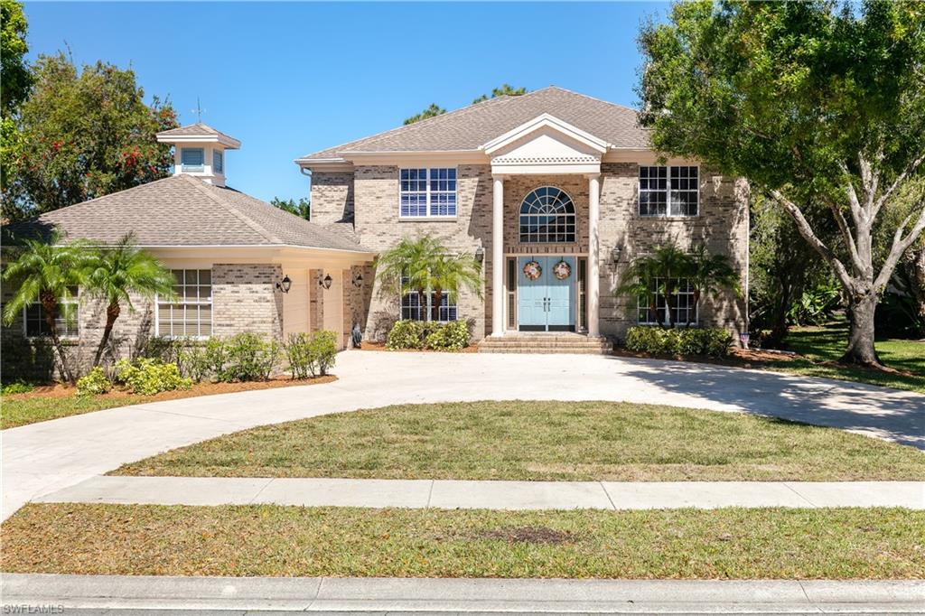Beautiful pool home in the gated community of Carillon Woods offers 4 bedrooms and 3 1/2 baths! Walk into the grand entry with soaring ceilings, real hard wood floors, formal living with double sided fireplace and dining room with a butlers pantry leading into the newly remodeled kitchen. The kitchen boasts beautiful white cabinets with large island, new appliances, pot filler, tile glass backsplash and quartz counters! The large island seats 4 and leads into the eat in kitchen and living room with double sided fireplace. All bedrooms are upstairs including the large master with en suite and his/her walk in closets. This home offers a remodeled kitchen and new appliances in 2017, new plumbing in 2014, 2 brand new AC units in 2019/2020, remodeled 1/2 bath in 2018, refinished pool, travertine paver deck and equipment in 2015,  new roof in 2020, and new water filtration system! This gorgeous home is walking distance to private school Bishop Verot High School, is in a great public school zone, and close to shopping, dinning and our awesome Florida beaches! Don't miss your opportunity to make this house your home!