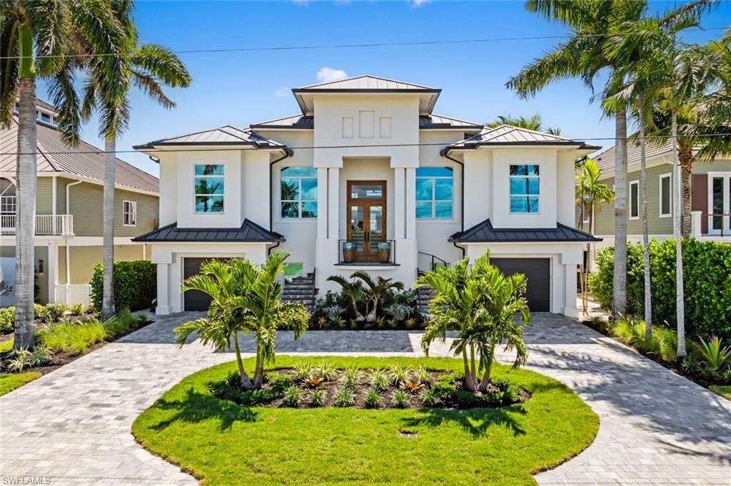 Exquisite waterfront retreat, perfectly positioned to capture some of Bonita's most remarkable views, featuring direct Gulf access and an unparalleled coastal lifestyle. Spanning approximately 4,590 square feet of living space, this redesigned four bedroom four and a half bathroom estate offers seamless fusion of luxury and comfort. Every detail of this residence has been thoughtfully curated inside and out, to deliver an exceptional lifestyle in one of Southwest Florida’s most sought after waterfront communities. The exterior impresses with a sleek aluminum roof, fresh paint, hurricane impact windows and sliding glass doors, and a refined entryway framed by custom railings and fencing. The resort style pool area has been completely modernized, featuring resurfaced finishes, marble decking, upgraded equipment, and vibrant LED lighting for the heated saltwater pool and hot tub. A custom boat dock with an attached deck ensures effortless access to the water and is designed to accommodate vessels up to 39 feet ideal for boaters. The backyard is a private oasis with turf, a full outdoor kitchen, and lush landscaping enhanced by irrigation, drainage, and landscape lighting. Step inside to soaring twelve foot ceilings and a light filled interior that blends elegance with functionality. The gourmet kitchen is a showpiece, outfitted with custom cabinetry, quartz countertops, an extended island, and top of the line Decor appliances. Plantation shutters and electric roll down blinds provide privacy and shade, while window tinting and three newer air conditioning units ensure year round comfort. The main living area features a built in entertainment center and dry bar, and every bathroom has been fully remodeled with premium finishes. The spacious primary suite includes dual walk in closets and a spa like ambiance.
Throughout the home the decorative wood ceilings add warmth and architectural interest, complemented by upgraded doors, trim, baseboards, and hardware. Additional highlights include a private elevator, dedicated gaming room, an air conditioned workout room, a steam shower, and a 40 bottle wine cooler. The expansive four car garage offers generous storage with additional space for a golf cart or even a small boat. Located just minutes from Bonita Beach, Vanderbilt Beach, The Ritz-Carlton Naples, and the upscale shopping and dining of Mercato. This property places you at the heart of Southwest Florida’s finest amenities. Families will also appreciate access to top rated schools in Collier County. Whether you're cruising to the Gulf or unwinding poolside, 250 6th Street West is a rare opportunity to own a fully upgraded waterfront sanctuary that truly has it all.