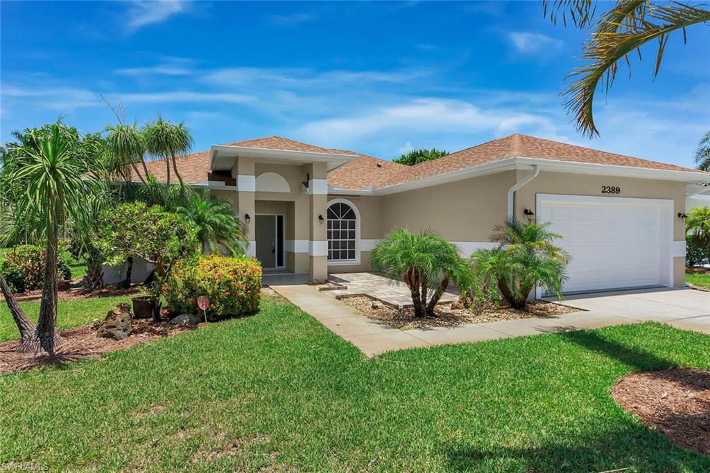 Come to the convenient, desirable Crown Pointe East neighborhood community to see this luxury home. Located across the street from its large lake. Clubhouse and amenities, this home has been meticulously maintained offering 3 BR, 2 Baths on an oversized lot with manicured landscaping. This Great Room, designed home has volume ceilings throughout, custom paint and window features. The spacious, eat-in kitchen has all stainless steel appliances, granite countertops and its equipped with loads of cabinets and storage. The laundry room is located conveniently by the kitchen. The master bedroom offers a walk-in closet and the master bath has "His and Her" basins and a glass-enclosed shower. Pocket sliders in the Great Room and dining room open to a large, private lanai and spacious rear yard. The two care garage is oversized and has additional storage and a work bench. Walk to the near-by Clubhouse, pool, fitness center and tennis courts. This home is only minutes to nearby Kings Lake Plaza with Publix, liquor store, restaurants, banks and is only a short drive to Olde Naples, 5th Ave. and 3rd Street dining and shopping, beaches and the famous Naples Pier.
