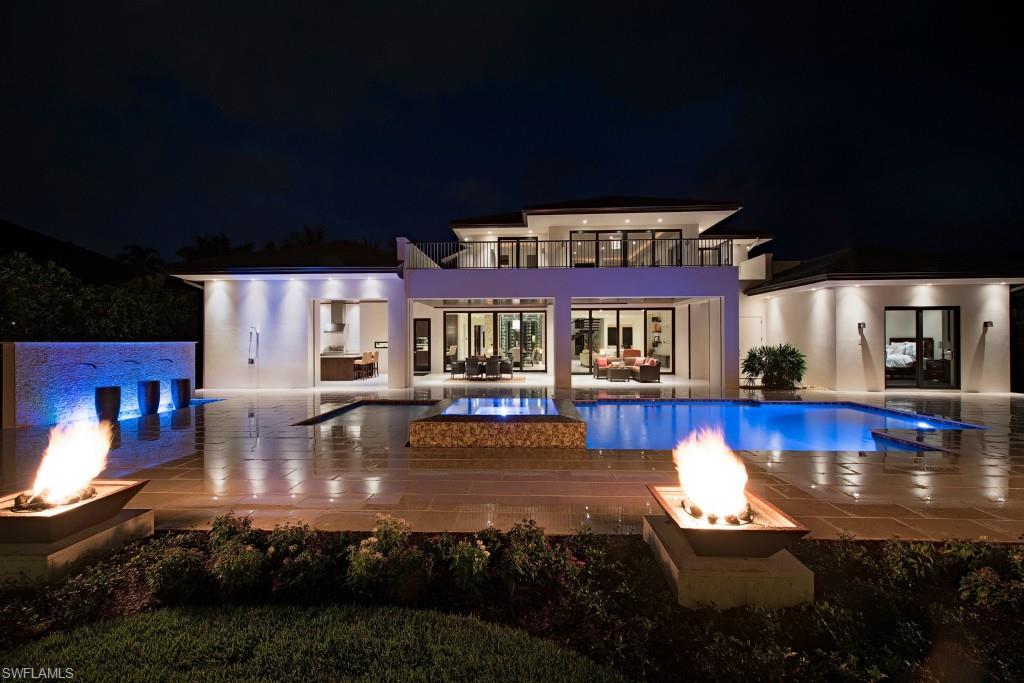 Stunning coastal  transitional  NEW single family home focuses  on comfort, space and quality. This home raises the bar for Moorings new construction,4582 Square feet under air,  4 bedrooms, 4 full baths, 1 half bath, large study and 3 car garage. The first floor features a gourmet kitchen that will satisfy the most sophisticated chef taste , open floor plan living/dining room featuring natural  imported San Pietro Limestone 30x30,large wine cellar holds over 1000 bottles ,oversized  master bedroom suite with gorgeous bath and spacious his and hers closets opens up to the patio and beautiful pool area.There is also a study/guest room.The second floor features a private large terrace overlooking the pool area, along with three spacious bedrooms, each with private baths and a very large media room. The outdoor living and entertainment area includes an amazing pool and negative edge spa, 3 fire displays, water falls and a gourmet outdoor kitchen. Solid concrete structures, beautiful marble and hard wood flooring,Pompeii quartz counter tops, solid wood cabinetry, low voltage lighting, all Sub-Zero and Wolf appliances complete this beautiful