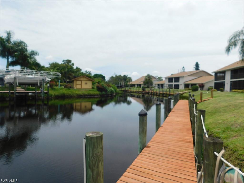 GULF ACCESSS CONDO, Great location for Boater enthusiast ! this 2 bed 2 Bath second floor End Unit is in the Riverbend community, just a short boat ride to the River. This second story condo with beautiful sunrises while looking down your gulf access canal from your enclosed Lanai! recently painted inside with storm shutters on all openings. Split bedrooms each with their own bathroom, Vaulted ceilings with a nice open plan, covered parking.
Take a quiet boat ride to downtown Fort Myers or to a number of restaurants in the area. Boat slips included for owners, first come first serve basis. Established community in tranquil wooded setting! Great location close to 
shopping, restaurants, and 1-75, 41, and SW Florida International Airport. Don't le this one slip away.