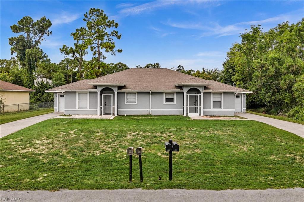 Excellent investment opportunity in the rapidly growing area of Lehigh Acres! This well-maintained duplex offers two identical units, each featuring a spacious open-concept layout with 3 bedrooms and 2 bathrooms, providing strong rental appeal for both long-term tenants and owner-occupants. One unit is currently tenant-occupied, providing immediate rental income, while the other unit is move-in ready—perfect for an owner-occupant or for securing a new tenant at current market rates.

Each side boasts a bright living area, generously sized bedrooms, a functional kitchen with ample cabinetry and breakfast bar, interior laundry space, and private driveway parking. Situated on a large lot with separate entrances and expansive backyard space, this property offers excellent privacy and versatility. Conveniently located near SR-82, shopping, dining, schools, and Fort Myers, making commuting and everyday living easy. Whether you're looking to expand your investment portfolio or live in one unit while generating income from the other, this duplex presents an outstanding opportunity in one of Southwest Florida's fastest-growing markets. Both units mirror one another in layout and condition. Don't miss your chance to own a turnkey income-producing property with excellent upside potential!

Some listing photos have been virtually staged to illustrate the property's potential.
