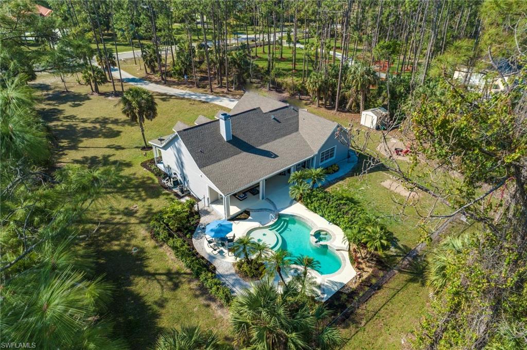 Welcome to your new home!  CITY WATER! NO WELL WATER! This beautiful 4 bedroom 2 bath pool home is situated on 2.33 acres of land is located on the edge of Golden Gate Estates...giving you the best of both worlds, proximity to beaches, shops and restaurants and privacy/space for you family.  Walking distance to Max Hosse Jr Community Park and Big Cypress Elementary School.  Enjoy the Brand new roof, open air pool and spa, fire pit, large covered lanai and huge yard!  The home boasts brand new bathrooms, new HVAC, painting and landscaping.  Move in ready and waiting for you!