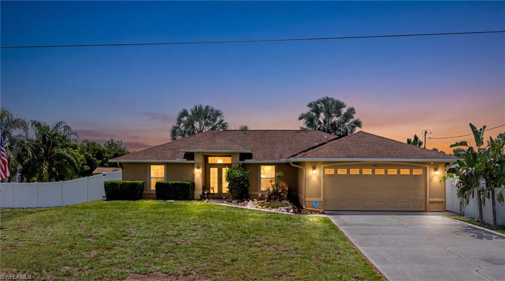 Welcome to your own private retreat! Situated on an expansive 0.72-acre fenced lot, this beautifully maintained home offers over 1,500 square feet of comfortable living space with tile flooring throughout and an impressive list of upgrades.  Step outside and enjoy the Florida lifestyle with your screened swimming pool, heated spa/Jacuzzi, pool heater, new pool skimmer, variable-speed pool pump, and plenty of yard space for entertaining, pets, or future additions. The spacious yard is enhanced by fruit trees, creating a peaceful setting where you can enjoy fresh fruit right from your own backyard.  Inside, you'll find a new A/C unit, an updated primary bathroom, new ceiling fans, elegant Hunter Douglas blinds, and a bright, functional layout designed for everyday living.  Additional highlights include paid-in-full solar panels for energy efficiency and long-term savings, a 30-amp RV hookup, and a spacious property that offers both privacy and versatility. Conveniently located near Southwest Florida International Airport (RSW), I-75, shopping, restaurants, and everyday amenities, this home combines peaceful outdoor living with easy access to everything Southwest Florida has to offer.  Don't miss the opportunity to own this move-in-ready property with exceptional features, energy-saving upgrades, and room to enjoy the Florida lifestyle!