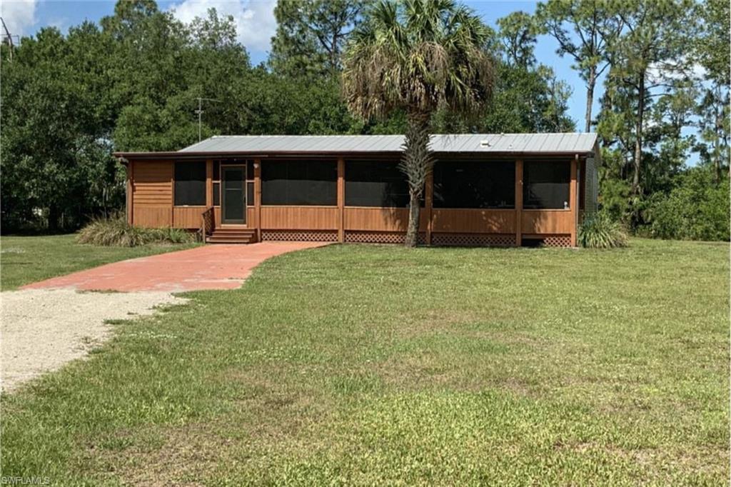 Charming 2-bedroom plus den home, with the den easily convertible into a 3rd bedroom, featuring two spacious full bathrooms and completely updated throughout. Located at the end of a dead-end road with a privacy gate, the property spans 5 acres, with tenants having access to 2.5 acres. Enjoy the quiet, peaceful setting and an almost 700-square-foot screened-in front porch perfect for outdoor living.
