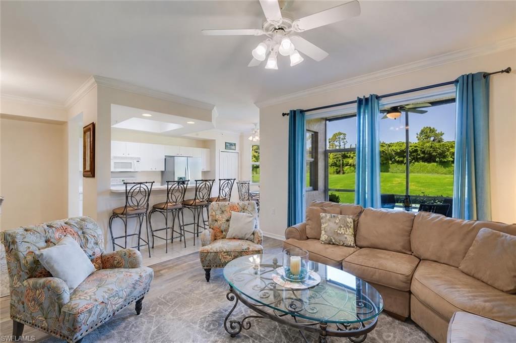 First Floor Golf Course Condo on the 14th Hole, Cypress Woods Golf & Country Club! Enjoy easy, single-level living in this 2 bedroom, 2 bath condo overlooking the 14th hole. Hard flooring throughout with new vinyl, crisp paint, and an open airy layout make this the perfect spot to spend all of your days & winters. West facing to enjoy those Southwest Florida evening skies that never disappoint! Offered turnkey with one assigned covered parking spot, one uncovered spot, and plenty of guest parking. Cypress Woods Golf & Country Club spans more than 110 acres of sparkling lakes, flowering fairways, and wooded nature preserves, a true all-inclusive bundled community where every homeowner is a member. Enjoy access to the 18-hole championship golf course (renovation completed by January 2027), with updated amenities: pickleball, tennis, a resort-style pool with food and beverage service, and a fully equipped fitness center, a long with a jam-packed social calendar of wine club gatherings, trivia nights, themed dinners, outdoor movie nights, fashion shows, magic shows, bingo, and more. Residents rave about life in this bundled community, from the buzz of the golf course to the ease of never running out of things to do. Enjoy a prime North Naples location surrounded by some of the area's best dining and shopping. This move-in ready condo delivers comfort, style, and an unbeatable sense of community in one of North Naples' most desirable golf communities.