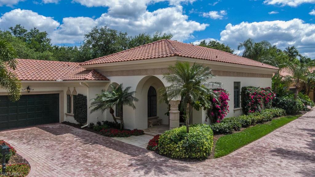 Stunning home in desirable location within Grey Oaks. Many updates made by current owner to enhance today's life style so you can just unpack your clothes and start living! Take a swim in the salt water pool surrounded with new deck tile and screened in with the new picture window pool cage or relax in the master bedroom sanctuary with 2 custom built walk in closets and a spa like bath. The chef will love cooking in the modern white kitchen with a brand new custom cabinet pantry adding lots of extra storage.  Prepare cocktails for friends & family at the centrally located bar w/ wine cooler and enjoy moving freely about from inside to outside through the many sliding glass doors. Two add'l bedrooms (one set up as a den) have ensuite baths & both have walk in closets. There is no shortage of fun activities here... pickleball, tennis, golf (3 courses), a 30,000 sf wellness center, bocce ball, the fabulous club pool & Pool Cafe dining to mention only a few! And if this isn't enough, Grey Oaks is within 10-15 minutes of Olde Naples, Venetian Village or Waterside Shops with world class shopping/restaurants and the white sugar sand beaches Naples is famous for!