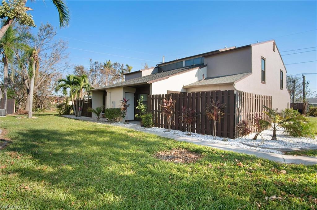 Amazing Location! This well maintained 2BR/2BA townhouse in the gated community of Sandalwood Estates is located in South Fort Myers and close to shopping, restaurants, grocery stores, beaches and more. Unit features tile and laminate throughout, kitchen with granite countertop and stainless-steel appliances and under cabinet lightning, both bathrooms are updated. Master bedroom on the first floor features a huge walk-in closet and sliding doors to your private fenced in patio. Upstairs you'll find a second bedroom, full size bath and a large loft area that could be used as office or open Den. Roof was replaced in 2018, new AC 2022 and new water heater 2020. This townhouse is move-in ready and sells Fully Furnished. Don't wait to schedule your showing, this won't last long!