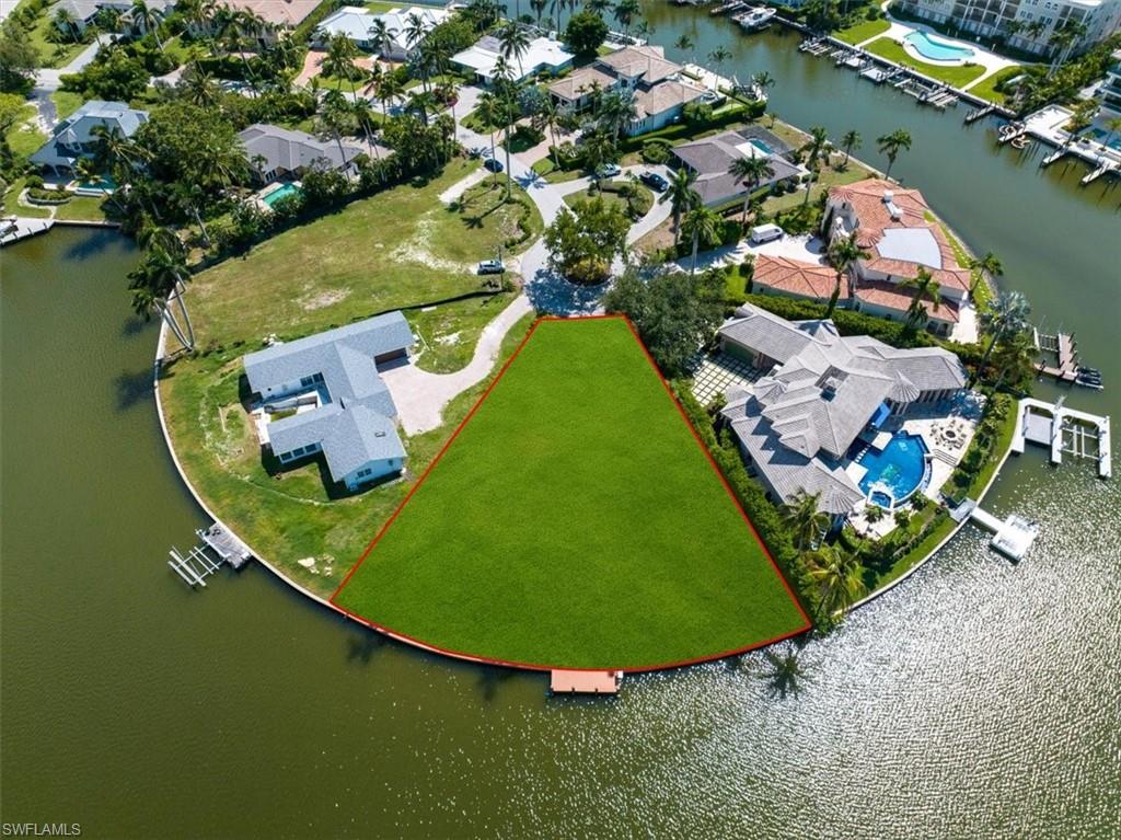 H11631 - Build you dream home of this half acre, cul-de-sac lot on Moorings Bay with 184 feet of frontage on the
Bay. Quiet and private location. Property is being sold at lot value as the house was damaged during
Hurricane Ian. Deck and dock included. Membership in the private Moorings Beach Park is available to
the future homeowner.