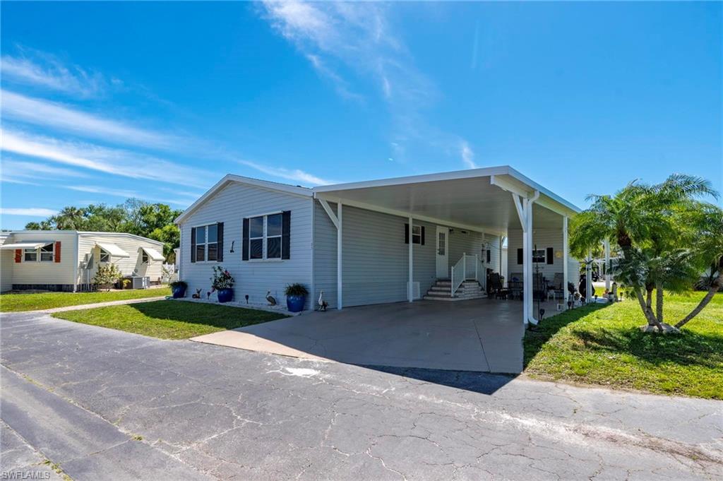 Motivated Seller " Port Charlotte Village was Voted #1 Manufactured home Community in Charlotte County for 2024". ** NOT IN FLOOD ZONE**Welcome to this delightful 2-bedroom, 2-bathroom home, ideally situated in a serene 55+ community with an exceptionally low HOA that includes water, sewer, internet, cable, lawn care, dog run, fishing, pool, recreational facilities, pool hall, card room , library, bocce, shuffle board, ,manager, reserves, and so much more. This charming residence is designed to give both comfort and convenience, providing an ideal space for enjoying Florida's relaxed lifestyle. Outside, the oversized insulated carport offers plenty of space for parking, while the large attached shed provides ample room for extra storage, making it perfect for hobbyists or those seeking additional space for belongings. The roof, newly installed in 2023, adds an extra layer of security and peace of mind, ensuring your home remains in excellent condition for years to come. Step inside to discover a well-designed floor plan that effortlessly combines style and functionality. The generously sized kitchen is a culinary enthusiast's dream, with plenty of counter space, cabinets, and room to prepare meals or entertain guests. The inviting living room is spacious and open, providing an ideal setting for gatherings or enjoying quiet evenings at home. Each bedroom is well-proportioned and features large walk-in closets, offering an abundance of storage to keep your living space organized and clutter-free. The tinted windows not only enhance privacy but also help regulate the interior temperature, making the home more energy-efficient and comfortable during the warm Florida summers. This delightful home is not only about indoor comfort; it's also about location and lifestyle. You'll enjoy easy access to nearby shopping, entertainment, and dining options, as well as being surrounded by elite golf courses for those who love the game. The stunning blue beaches of Florida are just a short drive away, allowing you to soak up the sun and enjoy the coastal lifestyle whenever you wish. The community itself offers a peaceful and friendly environment, perfect for those seeking an active, social, or relaxed lifestyle, with amenities and activities designed to keep you engaged and entertained. Don’t miss the opportunity to make this wonderful home yours, where you can enjoy a perfect blend of relaxation, comfort, and the active lifestyle you've been dreaming of!