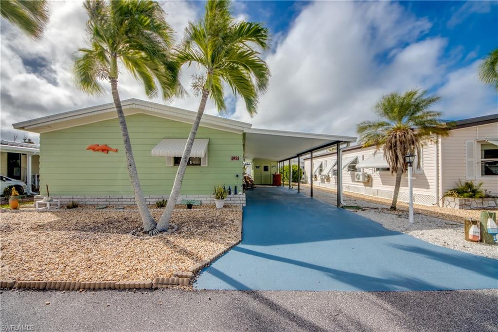 Welcome to island living in Pine Island Cove 55+ community in Saint James City. This home has 2 bedrooms, 1 1/5 bath, a large Florida room(264 Sq ft) under air, a new kitchen that makes a perfect retreat. Enjoy outdoor living and the friendly community and lot of activities and clubs for everyone to enjoy the outstanding amenities. There is a lakeside gathering area with covered pavilions, picnic tables and grills-perfect for socializing with neighbors and friends. 
 Pine Island Cove residents enjoy a saltwater heated pool, spa, clubhouse, pickleball, bocce, picnic pavilion, and boat/RV storage. Boaters will appreciate the Gulf-access community boat ramp with no bridges, offering quick access to some of Southwest Florida’s best fishing and the beautiful outer islands. This is a great opportunity to 
to create your own island retreat in a well-maintained, amenity-rich community just minutes form the Gulf & Bay. You own your land and the HOA is only $160.00.