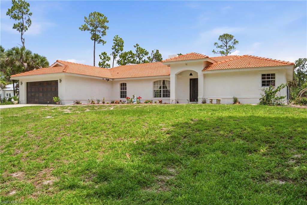 2.75 Acres, Large Double Lot, beautiful family estate. 4 bedrooms, 2 baths, family room with large TV included. Large patio and screened for outdoor family gatherings. Detached game room with pool table. ATV & dirt bike included. Newly painted, ready for new family.