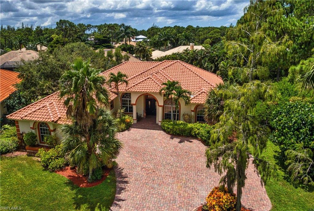 Remarkably Stunning Custom Single Family Home in the Luxury Gated Community of Hawksridge! Low HOA! Ideally Located between Grey Oaks and Banyan Woods. This Up-Scale Residence Features Four Bedrooms, Plus a Den, Three and a Half Baths, with Two Car Garage. Completely Upgraded Gourmet Kitchen with Custom Granite, Premium Kitchen Aid Appliances Featuring Enlarged Oven & Cook-top & Wood Cabinetry Featuring a Custom Coffee Cabinet, plus Hidden Cable TV Outlet. Numerous Upgrades in this Executive Home including Hardwood Flooring, Custom Lighting, Stunning Custom Front Door and Amazing Eight Foot Slider Doors Opening to Private Pool Area!!! Extra Large Screened in Lanai with Pavers Surrounding Pool and Spa in a Beautiful Landscaped Private Setting. 

HAWKSRIDGE Offers Residents an Amazingly Convenient In-Town Location with World Class Shopping and Restaurants at WATERSIDE, MERCATO and OLDE NAPLES. JUST MINUTES TO GULF OF MEXICO BEACHES!!! THIS HOME IS PRICED TO SELL AT A STEAL! CALL TO SCHEDULE YOUR PRIVATE SHOWING TODAY!
