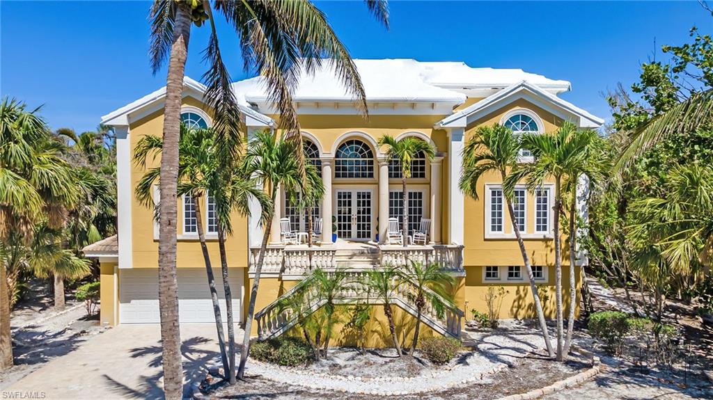 Wow! Here's the opportunity to own a truly beautiful and spacious home in one of Sanibel's premier neighborhoods - Kinzie Island! Ready to move in - This incredible home offers 5 bedrooms and 6 baths, beautiful kitchen, fireplace, outdoor kitchen, huge screen enclosed pool, spa and deck, boat dock and lift and a 3 car garage. The Kinzie amenities include association pool and tennis, bocce ball and a beach cabana, weight room, bathrooms, owner lockers and a boardwalk to the beach.  Home is completely concrete construction. Located on the East End of the Island! Selling fully furnished. This homes ground level was impacted by Hurricane Ian.