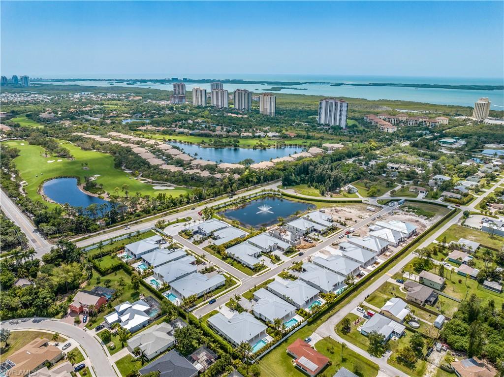 *This is a pre-construction purchase agreement. Expected completion Sept 2027** Welcome to Coconut Landing, a gated coastal contemporary new construction community of just 25 single family homes - WEST OF US-41, ELEVATED to "X" FLOOD ZONE! // 4553 Seagrove will be a custom plan built by Headwaters Construction. Home features will include a Generac Natural Gas 26kw generator, standing seam metal roofing, impact windows & doors throughout, 12' ceilings with tray details, 10' pocket sliders, walk-in butler’s pantry, and an open concept main living area. Four bedrooms (each with walk-in closets; dual in the primary), a dedicated den, and 5.5 bathrooms (including a full exterior pool bath). Material features will include quartzite countertops, white oak flooring, Sub Zero/Wolf natural gas appliances, and Kith cabinetry.  // Welcome to Coconut Landing, a new construction community west of US41 in Estero. Outdoor living features will include a stone pool deck and heated salt swimming pool and spa. // AMENITIES & MEMBERSHIP: The following amenities listed are at the Hyatt Regency Coconut Point and Spa approximately 1/4 mile from Coconut Landing: lap pool, adult pool, lazy river, restaurants, fitness, spa, sauna. Coconut Landing residents enjoy a free one-year membership to the Regency Hyatt Coconut Point Resort and Spa, with the option to renew thereafter (no obligation; membership is $8,500/year for up to 5 household members; see supplements, subject to change). This membership does not include access to the private Pelican Landing beach park. HOA DUES include common area landscape, fenced pet play area, high speed 980mbps CenturyLink (Quantum) internet, keypad gated community entry, street lighting PLUS weekly cleaning and chemical balance of homeowner swimming pool and spa, weekly homeowner landscape maintenance, lawn irrigation, and exterior landscape pest control. //2025 Tax value reflects lot value only due to pre-construction status at time of listing (Lee County Property Appraiser)  //