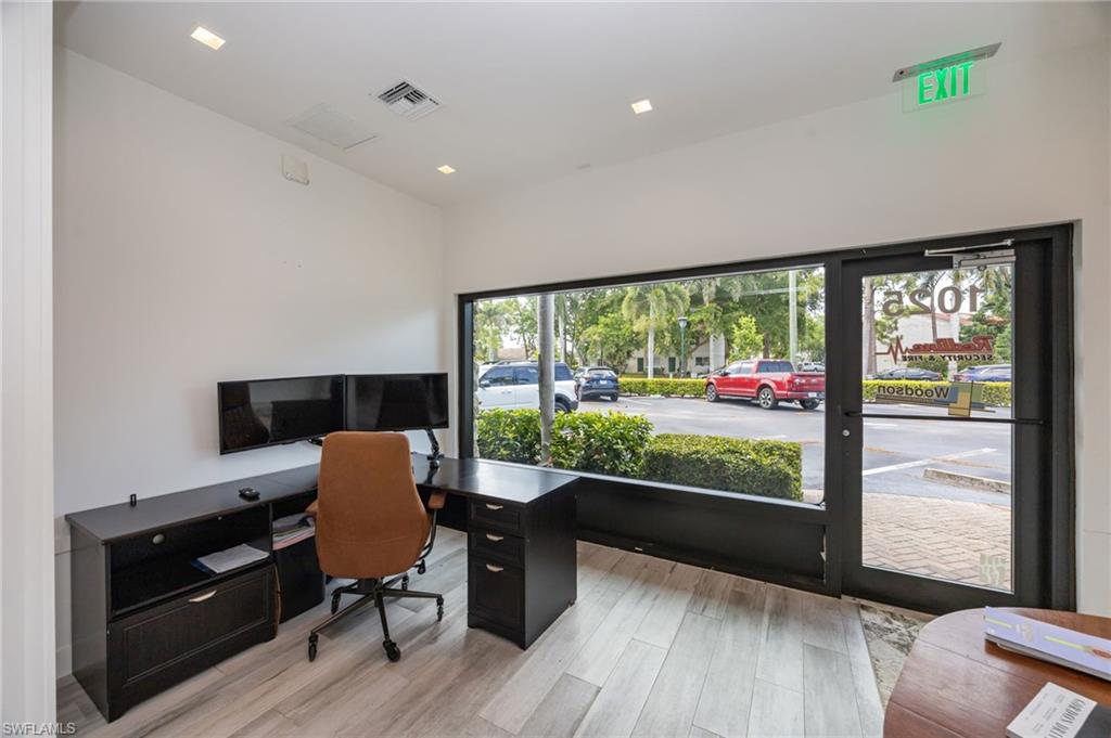 Renovated 881 SF retail/office condo in Municipal Plaza on 5th Ave N in downtown Naples. Full build-out with impact glass windows and doors and an HVAC system approximately three years old. D-Downtown zoning supports a range of uses including showroom, retail, office, gallery, and professional. Single-story building with storefront and rear access. Available for immediate showings. Well suited to an owner-user or an investor in one of Southwest Florida's strongest retail corridors. Walkable to the 5th Avenue South shopping and dining district and minutes from the Gulf. Association fee $1,500 per quarter. Buyer and buyer's agent to verify all measurements, zoning, and permitted uses.