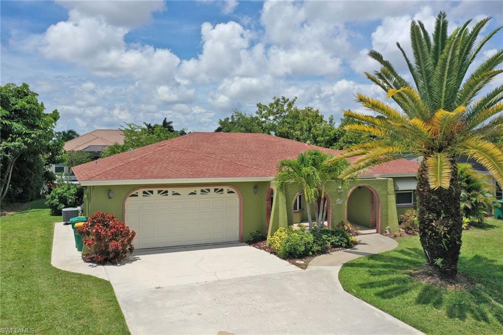3 bedroom, 2.5 bathroom home with den will give you 1810 sq ft of generous space. This home could easily be converted into a 4 bedroom. Irrigation is on well. Located in the center of town, close to downtown shopping, dining and beaches! Located in Coconut River Estates, direct gulf access with a voluntary low HOA! Community boat ramp, heated pool, tennis courts, shuffleboard courts, dog park and brand new pavilion available for free rental all available for a low, voluntary $450 yearly fee.