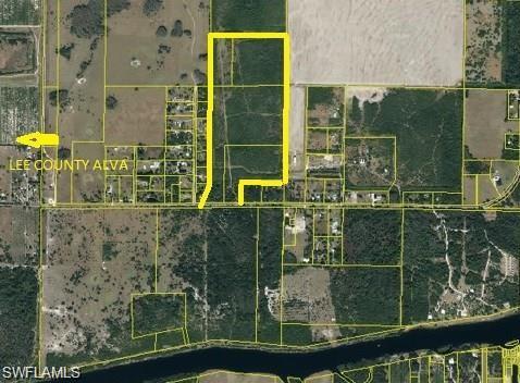 135.47 acres Just 3/4 of a mile east of Lee / Hendry County line on N River rd. Rare find this close to lee county with Hwy frontage. Drive in to the wooded entrance and just over the creek continue up the hill to a high elevation of extra fill, hills and cut outs old river spoil. This property is presently being used for cattle. It has a 2 wells one with solar pump for water in the back and in the front east side electric meter with well pump full system. It fronts hwy78 (N River rd) This property is divided into 4 separate adjoining parcels. 12.86ac ZONING RGM3(1-28-43-18-A00-0001.0100), 31.28ac ZONING A2 (1-28-43-18-A00-0001.0400), 28ac ZONING RG3M (1-28-43-18-A00-0002.0000) 63.39ac ZONING A2 ( 1-28-43-18-A00-0006.0000) all measurements may very boundary sketch in office. ALSO a past 246 mobile home plat on 28+ acres was found.