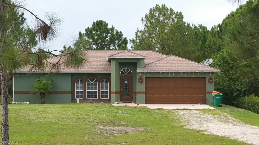 This ranch style, 3 bedroom, 2 bath home sits on over an acre of land and includes an attached 2 car garage, above ground pool with deck and is totally fenced complete with a entry gate to keep you feeling secure.  The home is only 10 years young having plenty of trouble free years for the roof and central air conditioning.  This home also features tile and laminate flooring, granite counters, including a breakfast bar, stainless appliances, ceiling fans in addition to central A/C, screened lanai and a lovely scenic mural painted in the master bedroom.  There is also a open split floor plan, spacious garage, laundry room that includes a washing sink.    Priced under market value with low inventory means this charming home in peaceful surroundings will not stay on the market long.