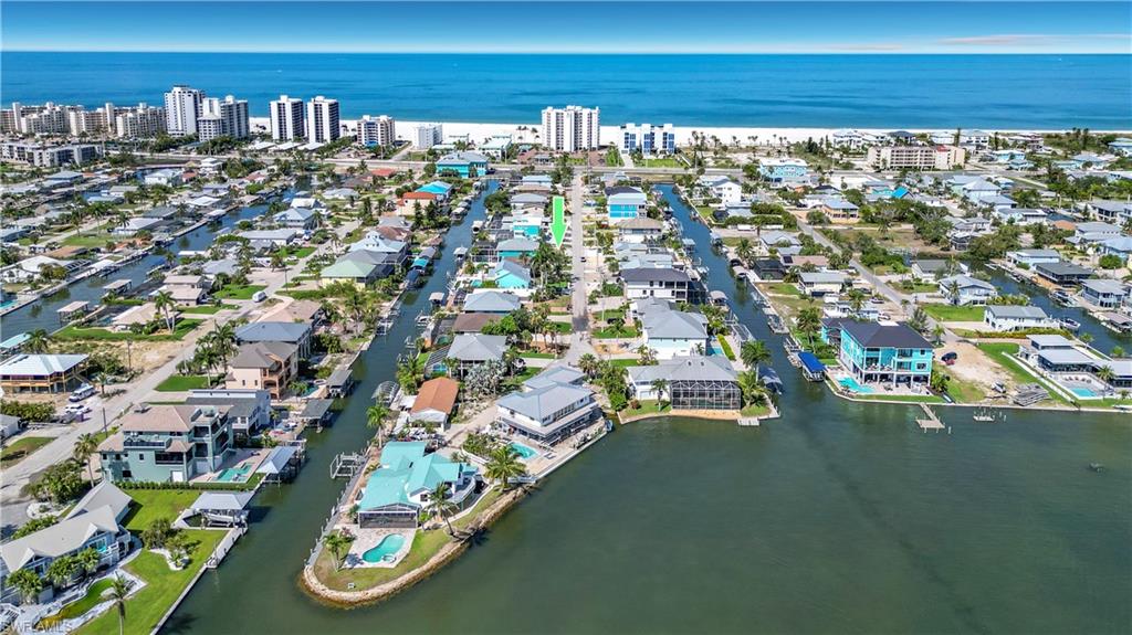 South-end waterfront lot on Curlew Street with direct Gulf Access for boaters, and just a short stroll across Estero Boulevard to the white sandy beaches. Available now for your custom-built island home perfect for year-round and seasonal residence or an income producing vacation rental. Enjoy the privacy on this canal-front property located close to the bay, with nearby shops & restaurants, Santini Plaza Marina, entertainment, CVS Pharmacy, 7-11 with gas station, the local Publix grocery store, Lover's Key State Park, several beachfront resorts and more. New, beautiful homes are going up, as value increases island wide. This is an opportunity to build a waterfront home in the Town of Fort Myers Beach now or hold the land for future opportunity. You and your guests are going to love it here!