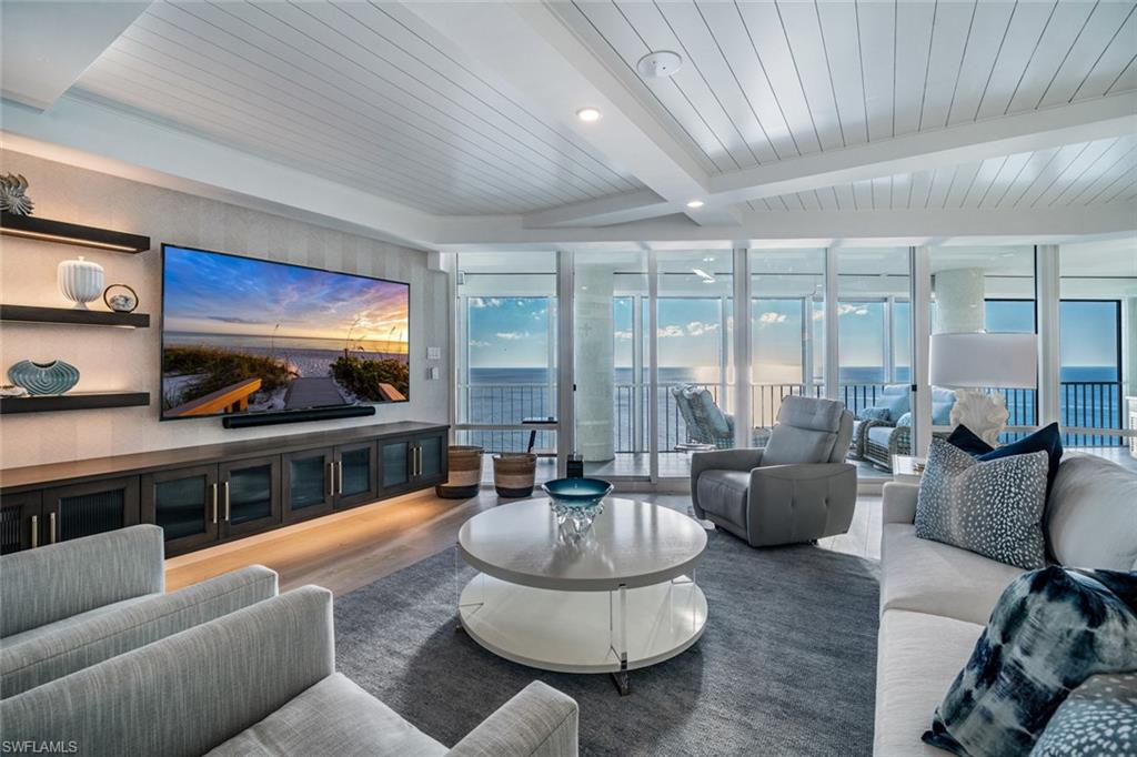 Nestled in the heart of prestigious Park Shore, Le Ciel Park Tower defines the pinnacle of waterfront living. Offering sweeping panoramic views of both the Gulf of Mexico and the Bay, this fully renovated residence by Design West embodies refined elegance and sophisticated coastal luxury. Upon entering, you are immediately captivated by spectacular southwest vistas and the residence's exceptional craftsmanship. Every detail reflects the use of the finest materials and finishes, creating a seamless blend of style and comfort. Expansive floor-to-ceiling windows bathe the spacious living areas with abundant natural light. The open-concept living and dining space flows effortlessly into a state-of-the-art kitchen featuring top-of-the-line appliances, custom cabinetry, and exquisitely designed countertops. Residents enjoy a fully renovated lobby and common areas, a well-appointed fitness center, 24-hour security, bike racks, storage, and a convenient car wash. Two beautifully designed guest suites and an expansive pool just moments from the sand complete this unparalleled living experience. Le Ciel Park Tower offers effortless and elevated waterfront living in one of Naples’ most sought-after communities.