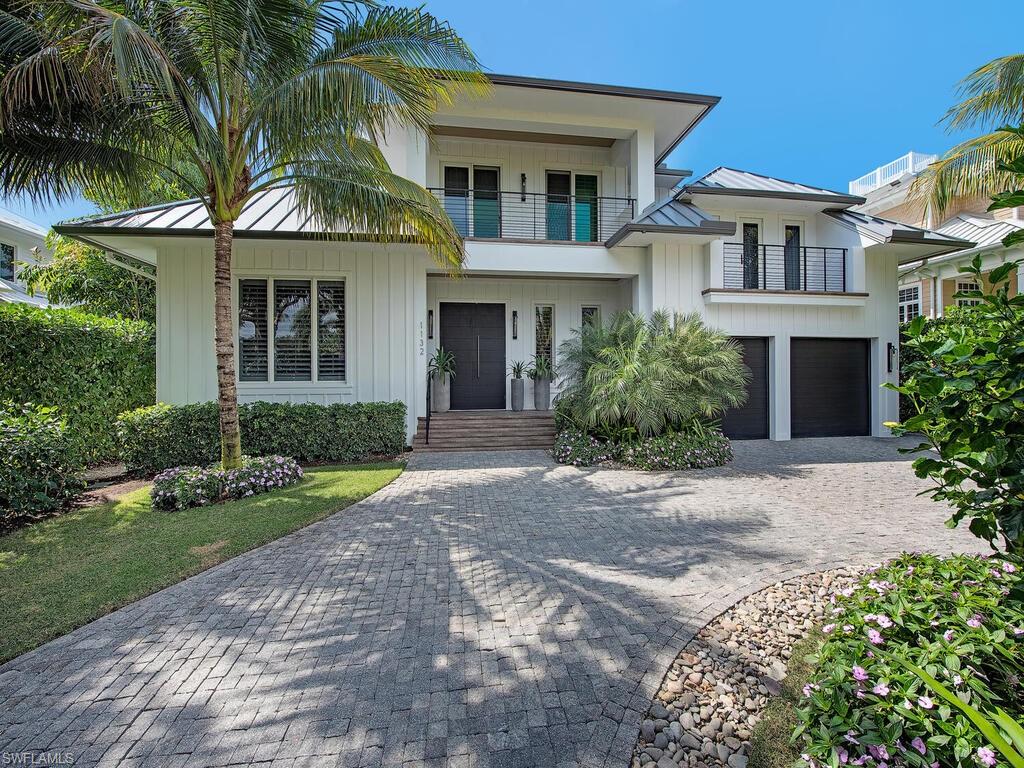 Conveniently located in the heart of Olde Naples. Walk everywhere!! Just a few blocks from 5th Avenue, 3rd Street South, Naples sugar sand Beaches, Cambier Park Tennis, Art shows, Yacht club, and Fishing at the Pier.  A laid back St. Barths Island vibe evokes a peaceful, vacation-like experience every day. This capacious floor plan is decorated in neutral tones, the fluid lines and open spaces coalesce to produce a relaxed, sophisticated style. Offered with exquisite chic furnishings sourced from Paris, France. The temperature controlled wine room and bar is great space for entertaining guests. The Lacanche range, a chefs dream. The master en-suite creates a peaceful, spa-like atmosphere. There are 5 bedroom en-suites, a den, 2 offices, and laundry facilities on 2 floors. Expansive hurricane-rated sliders make indoor-outdoor living a breeze and lead to an outdoor kitchen and ample seating. The pool area has its own outdoor bath, a Baja shelf and large built-in spa. Outdoor electric shades provide protection from storms and direct sunlight. Equipped with a ChargePoint Home Flex 240-volt charger for your electric vehicle. Enjoy your own island oasis in this stylish, peaceful home.
