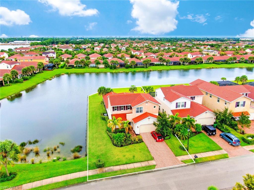 Location, Location. Location Lake Front on the side and rear of home, you are surrounded by water, Rare Find. This  will not last long available now in North Naples.  This family home is a  4 bedroom 3 bath  house  at Manchester Square and is truly  a hidden gem in a prime location with a short drive to the gulf beaches, downtown, shopping and much more.   This home has a spacious layout with over 2775 sqft under air. It is complete with granite counter tops, tile and carpet  flooring, a shower tub combo in the master  with an oversize laundry room, and plenty of storage space.   Manchester Square is a  gated community offering many amenities, low fees and located in an A rated school district.