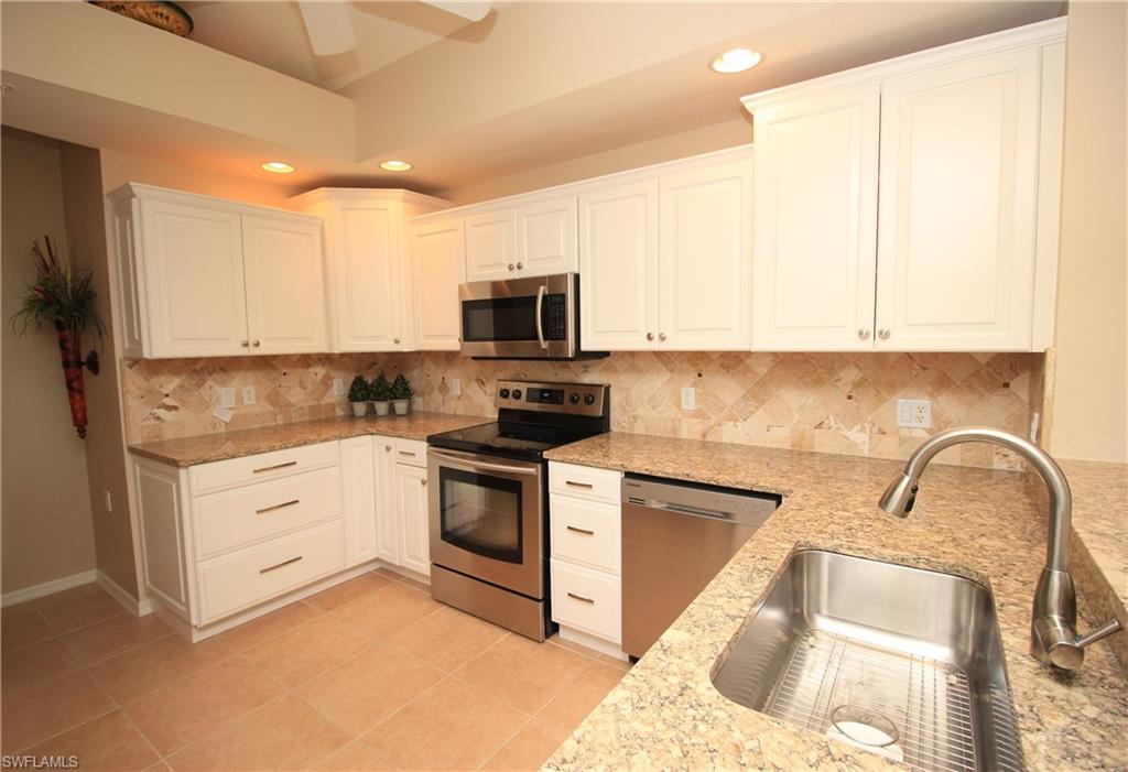 BEAUTIFUL Upper level coach home, with too many updates to list...MUST SEE! Unit is a short walk to the Clubhouse! Desirable No Naples bundled golf community of CYPRESS WOODS GOLF & COUNTRY CLUB features an 18-hole championship course designed by Gordon Lewis with a putting green and aqua range. Cypress Woods is located near many of the area's attractions & conveniences, including county & state beaches and preserves, the Mercato, shopping & restaurants, places of worship, schools, medical care, I-75, and RSW Airport. This unit has a 2 car garage & features a great room with 3 split bedrooms, 2 bathrooms and a screened lanai with golf course and spectacular sunset views. The kitchen has plenty of cabinets and counter space, with a counter height bar for additional seating and a separate breakfast nook. The great room with dining area is ideal for entertaining. Community amenities include a clubhouse with an award-winning restaurant and bar, large heated community pool, lap pool, spa, 4 lighted tennis & pickle ball courts and fitness facilities with a studio for aerobics & yoga. Don't miss your opportunity to own a piece of paradise in one of Naples best bundled golf communities.