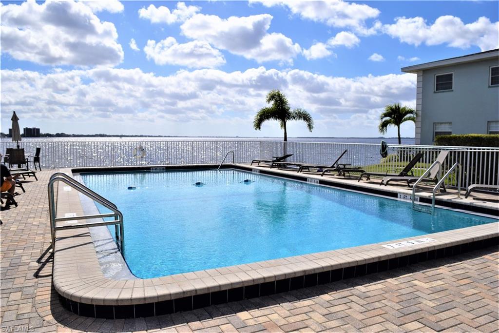 What a great location and a perfect home to relax by the pool with gorgeous views of the Caloosahatchee River. Contemporary, Cute one bedroom first floor unit with an open floor plan not to mention water is included. Brand new Air Conditioner in 2019, new tankless hot water tank, new pipes. The amenities include a riverfront pool, community room, fitness room and BBQ grilles. This Condo is a few blocks from entertainment and dining. And a quick dash over the bridge to the Historic Downtown District where there is so much to choose from; shopping, restaurants, live music, clubs and countless Festivals throughout the year. Go and Show, bring us an offer!