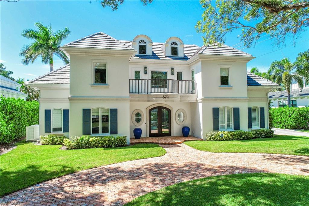 Stunning 4 bedroom plus den, 3 1/2 bath home just 4 1/2 blocks to the beautiful Naples beach. Complete interior remodel and saltwater pool refinish. The kitchen boasts a large island with quartz countertops, breakfast nook, and new kitchen appliances. This home has a washer and dryer on both the first floor and second floor. Two of the three guest bedrooms and family room, each have their own private balcony. The home construction consists of concrete block on both the first and second floor, as well as impact resistant windows and doors. The master bedroom is located on the first floor. Dine in the best restaurants Naples has to offer, on 5th Ave S., and 3rd St S. Take a stroll along the world-famous Naples Pier. Close to the Naples Community Hospital and Wynns Market. This home did NOT receive any damage from Hurricane Ian and is NOT located in a FEMA designated Flood Zone. This means that lenders will not require flood insurance as a requirement for a home loan.