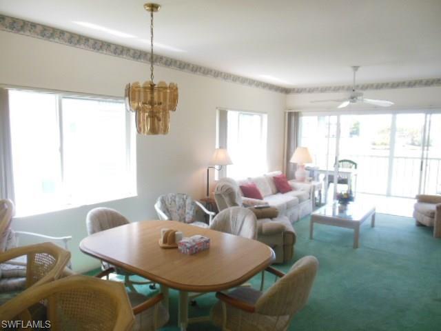 Very light and bright 2 br 2 ba end unit in the much desired Muirfield building. Walk to clubhouse, pools, pro shop and tennis courts. Great location close to beaches, shopping, restaurants, public library, health care, doctors office's and all S.W. Florida has to offer. Bike or walk to the back entrance to Lakes Park, yet so quiet, you’ll feel like you’re miles away! Walk to clubhouse, tennis courts and 2 pools. Screened lanai overlooks the 9 hole golf course (for which up to 2 members are included in low association fees, along with water, sewer and basic cable TV!) Laundry in the residence. Extra storage located next to common elevator! Well kept community features 3 swimming pools, community center/club house, bingo and dance floor...with golf pro shop, 2 tennis courts/ pickle ball, shuffleboard, bocce ball, walking path, library, and plenty of activities if you like to be involved. Management is on site. Enjoy a round of golf, a bar-b-que in the shaded picnic area, or stroll out on the dock over the water for the sunset or around the community on the biking/walk paths. Great investment as the 2017 season already has a tenant in place.
