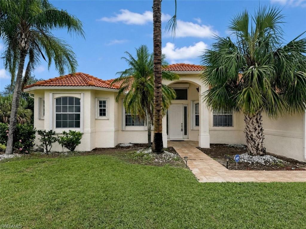 Discover the rare opportunity to lease an expansive estate home offering privacy, flexibility, and room to breathe. This unfurnished annual rental offers 4 bedrooms plus a den, 3 full bathrooms, and 2,753 square feet of living space on a fully fenced 2.6-acre lot. Enjoy exceptional privacy, a gated entrance, RV and boat parking, and the convenience of no HOA approval process. Inside, you'll find updated flooring throughout the main living areas, a spacious open-concept layout, and a beautifully updated kitchen featuring quartz countertops, stainless-steel appliances, ample cabinetry, and a breakfast bar. The versatile den is ideal for a home office, playroom, or potential fifth bedroom. The oversized primary suite includes two walk-in closets and an en-suite bath with dual sinks, separate shower, and sunken Jacuzzi tub. A unique third bedroom offers a private entrance, making it ideal for guests or multi-generational living. Outside, enjoy a large screened lanai overlooking the expansive grounds with mature fruit trees, including mango. Lawn care and well water maintenance are included. Washer and dryer in residence. Pet-friendly with owner approval. Immediate occupancy available. Additional highlights include: 3-car garage, Washer and dryer included, Lawn care included, Well water maintenance included, Experience the privacy of acreage living while remaining within easy reach of Naples shopping, dining, schools, and everyday conveniences.