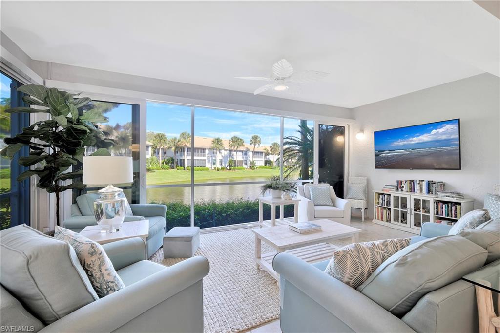 PRICE REDUCTION!!!!  Lovely first floor corner unit in the prestigious Harbor Landing at Bonita Bay just had a HUGE price reduction. Owners are VERY MOTIVATED!  Do not miss this exceptional opportunity to live in a beautifully designed and well maintained first floor 2BR/2BA + study condo, in the highly desirable and award winning Bonita Bay Community.  This corner unit offers an abundance of natural light and has an unobstructed lake view from the glassed/screened-in lanai, kitchen, and living area.  It is adjacent to a common area which provides a large grassy space surrounded by manicured landscaping and mature trees. All polybutylene piping was replaced in later 2021.The swimming pool and community room are steps away in the Harbor Landing subdivision.  The condo is also conveniently located just a short walk to the marina and Backwater Jacks Restaurant.  Free membership to Bonita Bay’s private beach is included.    
As part of the Bonita Bay community you will have access to miles of hiking trails through beautiful nature preserves, several parks, bay pier, 16 pickleball courts and the option of golf and club membership.