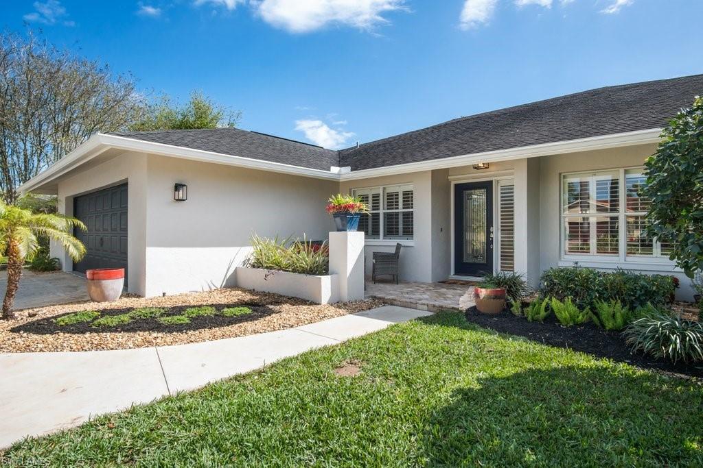 This beautiful, spacious and meticulously maintained PALM RIVER home sits on .29 acres with 4 bedroom, 3 bathroom, custom kitchen, Plantation Shutters, 2 A/C Units, 2 car garage, Circular driveway, Fenced in Backyard, New Landscaping, Screened in Lanai with Brick Pavers, Appliances to include a double dishwasher, Impact Glass Windows, Double French Doors, Beautiful Wood Floors, Fireplace and fresh paint in and out.  Close to Mercato, Gulf Beaches, Shopping, and Dining. Don't let this opportunity pass you by.