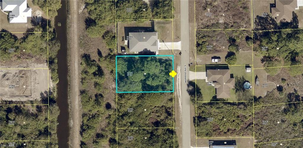 Imagine ending each day with tranquil canal views from your own backyard. This beautiful canal-front homesite offers the privacy and peaceful atmosphere that so many buyers are looking for, with no rear neighbors and plenty of room to build your custom Florida home. Located in one of Lehigh Acres' rapidly growing neighborhoods, you'll enjoy easy access to SR-82, Fort Myers, shopping, dining, and Southwest Florida International Airport. Whether you're building your forever home or making a smart investment, this waterfront property is an opportunity you won't want to miss.