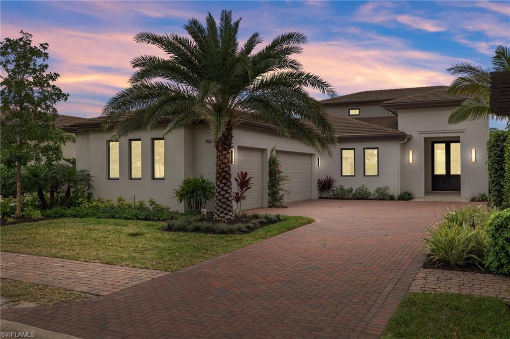 This home completed new construction in January 2023 and has never been lived in! Built by London Bay the Tortuga home is nestled within the neighborhood of Lucarno, inspired by the charm and classic style of Europe's Mediterranean region. The home features breathtaking views of the lake and in walking distance to Mediterra's Italian Parterre Garden. The sleek, contemporary kitchen boasts designer cabinetry and appliances as well as an island breakfast bar. The open great room plan includes sliding glass doors that lead to a covered area equipped with outdoor kitchen, overlooking the picturesque custom pool and spa. The home's master suite features a luxurious bathroom with freestanding soaking tub, walk-in shower, dual vanities, an oversized walk-in closet and hardwood floors throughout the entire home! Including the three-car garage and outdoor living and dining areas, the Tortuga offers 4,817 total square feet.