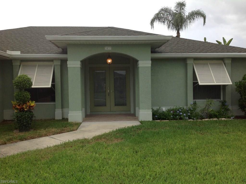 This home is located South West of Surfside Blvd, one of Cape Coral's most sought after neighborhoods.  Quiet street with well maintained homes.  Outdoor window Bahama shutters create a charming curb appeal.  Fabulous layout with vaulted ceilings in the great room. The flow is excellent for relaxing and entertaining.  Lovingly maintained, complete with neutral toned Travertine flooring and hi-end kitchen and bath fixtures.  Granite counter tops in kitchen and baths.  Stainless appliances, kitchen Aid gas stove top and convection oven with warming drawer, matching microwave with browning option.  Huge Master walk-in closet with ample storage.  Outdoor grill area landscaped for privacy.  Complete with granite patio bar, Viking gas grill with lighted vent hood, wood burning stone fire Chiminea, granite bench, pillars, TV and outdoor speakers.  Lanai includes granite storage for a beer keg, wine fridge and ice maker.  Also has an Electric Heated pool and above ground cedar hot tub.  RUUD 19 seer air conditioning unit installed in 2011.  Front load washer/dryer with extra storage pedestals and storage cabinets in the laundry.