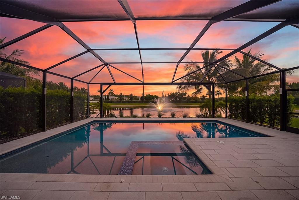 Resort-Style Lakefront living in Tuscany Pointe! This impeccably maintained 3-bedroom + den, 2-bath residence offers the perfect blend of luxury, comfort and Florida lifestyle. Situated on a premium lakefront homesite with a picturesque water feature, this move-in-ready home is loaded with designer upgrades and exceptional finishes throughout. The backyard is truly a private oasis, featuring a custom heated saltwater pool with built-in spa, expansive sun shelf for lounging, and a spacious screened lanai where you'll enjoy breathtaking sunset views and peaceful waterfront scenery. Inside the bright open-concept floor plan is designed for effortless entertaining. The gourmet kitchen showcases top-of-the-line Jenn Air stainless steel appliances, elegant custom cabinets with slide-out and soft close drawers, breakfast counter that comfortably seats 4-6, walk-in pantry with abundant storage, designer backsplash and quartz counter tops. The luxurious owner's suite offers a relaxing retreat, complete with a spa-like bathroom featuring a separate soaking tub and shower. The versatile den is ideal for a home office, media room or guest space. Additional premium upgrades include a hard-wired security camera system, 10' ceilings, 8' doors, elegant tray ceilings, crown molding, plantation shutters on all windows, and an air-conditioned garage, along with numerous high-end enhancements that reflect true pride of ownership. Every detail has been thoughtfully selected to create a home that is as beautiful as functional. Located in the highly sought after gated community of Tuscany Pointe with low HOA fees and an outstanding North Naples, location, you're just minutes from world-renowned Gulf beaches, Founders Square, Mercato, Waterside Shops, championship golf, exceptional dining, and top-rated schools. This is more than a home--it's the Naples lifestyle you've been waiting for. Schedule your private showing today before this exceptional lakefront property is gone.