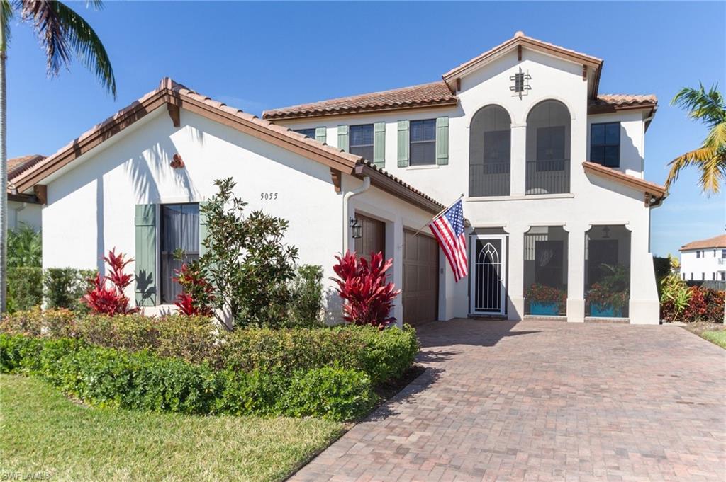 H.14153 - Luxury home in heart of Ave Maria. Two story home with upper balcony off master, church & lakefront views. Two-story super screen cage. Four bedroom,three bath with three car garage (outside keypad).Impact doors & windows throughout. Custom hardwood floors. Gourmet kitchen & cabinets, range with induction cook top, exterior vent fan, pull-out pan drawers, under-cabinet lighting, pendant lights, tile backslash, custom deep sink. Exceptional quality in finishes. Beverage chiller in niche, front loading washer/dryer on pedestals, attic wi-fi router, additional closet shelving, mail box on property. Custom pool, salt-water with heater, power awning, outdoor speakers, exterior flood lights, fenced yard. Home has over 50 upgrades.